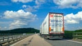Long truck operated by db schenker on the highway e4