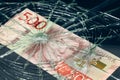 Sweden money, Fall of the Swedish currency, Weakening of the Swedish krona, 500 Swedish krona banknote lying behind the broken Royalty Free Stock Photo