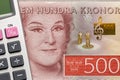 Sweden money, 500 Swedish crowns banknote and calculator, Financial calculation concept Royalty Free Stock Photo