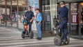 Sweden police on duty near culture house, using segway, Stockholm, Sweden, august 2018