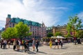 Sweden, Stockholm, May 29, 2018: Young people play, walking and spend time at Hotorget Square