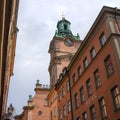 Sweden, Stockholm, on an old street in Gamlastan. The ancient part of the city. The bell tower of the church of St Royalty Free Stock Photo