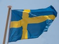 Sweden the Swedish flag waving in the wind on a flagpole Royalty Free Stock Photo