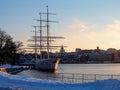 Sweden - winter Stockholm - sailing ship near quayside at sunset Royalty Free Stock Photo
