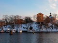 Sweden - Winter Stockholm - yachts near city quayside at winter day sunset Royalty Free Stock Photo