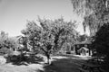 Swedish in black and white shot. tratitional house in Smalland, fence, garden