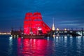 The Swedish brig `Three crowns` Tre Cronor against the background of Trinity Bridge. Holiday `Scarlet sails`