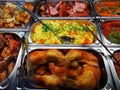 Swedish buffet food in stainless steel trays