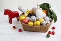 Swedish Christmas gift basket with sweets, fruits, and champagne Royalty Free Stock Photo