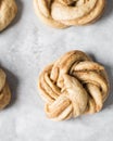 Swedish cinnamon buns dough on a parchment lined baking pan