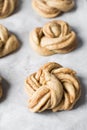 Swedish cinnamon buns dough on a parchment lined baking pan