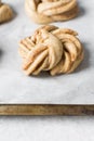 Swedish cinnamon buns dough on a parchment lined baking pan