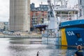 Swedish coast guard brings up to deck a sunken sailboat