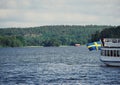 Swedish flag back on a white boat Royalty Free Stock Photo