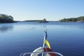 Swedish flag on the sea island Royalty Free Stock Photo