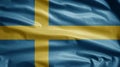 Swedish flag waving in the wind. Close up of Sweden banner blowing, soft silk Royalty Free Stock Photo