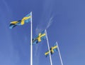 Swedish flag waving with the wind flow under the blue sky for national day celebration Royalty Free Stock Photo