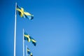Swedish Flags in clear blue sky - Gothenburg, Sweden