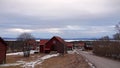 Swedish houses on shore of Frozen lake Orsa in Sweden Royalty Free Stock Photo