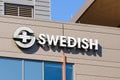 Logo of the Swedish Medical Center in Issaquah Washington