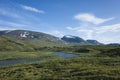 Swedish Lapland landscape. Arctic environment of Scandinavia in warm summer sunny day with blue sky. Alesjaure on Kungsleden