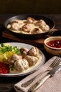 Swedish meatballs  with creamy gravy, mashed potatoes and lingonberry sauce. Royalty Free Stock Photo