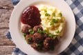 Swedish meatballs kottbullar with a side dish mashed potato closeup. horizontal top view