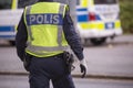 Swedish Police Officer with Reflective Vest and gun