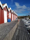 Swedish red wooden boat huts