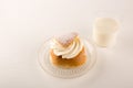 Swedish Semla and Glass of Milk isolated on white background, copy space Royalty Free Stock Photo