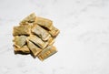 Swedish snus chewing tobacco on a white granite background