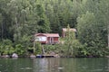 Swedish summer house in lush nature Royalty Free Stock Photo