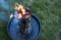 Swedish torch fire burning stub on plate for rest or to cook food chill mood