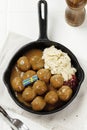 Swedish Traditional Meatballs with Boiled Vegetable. Mashed Potatoes, and Cranberry Sauce Royalty Free Stock Photo