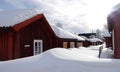 Swedish wooden red church houses in Lovanger kyrkstad in winter in Sweden