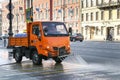 Sweeper for cleaning of streets, watering the sidewalk on the Nevsky Prospekt Royalty Free Stock Photo