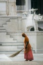 Sweeper at a Jain temple in India