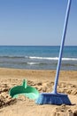 Sweeping the beach (irony) Royalty Free Stock Photo