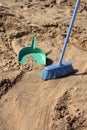 Sweeping the beach (irony) Royalty Free Stock Photo