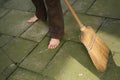 Sweeping with broomstick