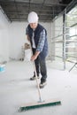 Sweeping floor dust Royalty Free Stock Photo