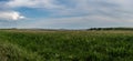 Sweeping Panorama of Grass in Badlands