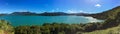 A sweeping panoramic view of the beautiful Marlbough Sounds, New Zealand, sparkling waters, clear blue skies