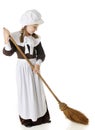 Sweeping Pilgrim Girl Royalty Free Stock Photo