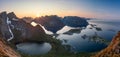 Sweeping super panorama from Reinebringen shows the midnight sun over Lofoten Islands, Norway, illuminating the village of Reine Royalty Free Stock Photo