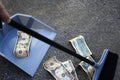 Sweeping up money Royalty Free Stock Photo