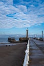 Sweeping view along the hand rail at White Harbour Wall Royalty Free Stock Photo