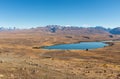 Sweeping views of the spectacular golden Mackenzie Basin from the top of Mt John including Lake Tekapo