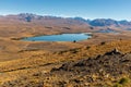 Sweeping views of the spectacular golden Mackenzie Basin from the top of Mt John including Lake Tekapo