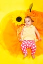 Sweet African baby in doted pants and yellow shirt Royalty Free Stock Photo